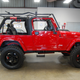 Illustration for article titled Could This Crazy Viper-Powered 2005 Jeep Wrangler Unlimited Possibly Snake $52,000?